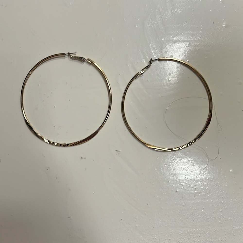 Gold hoops never worn